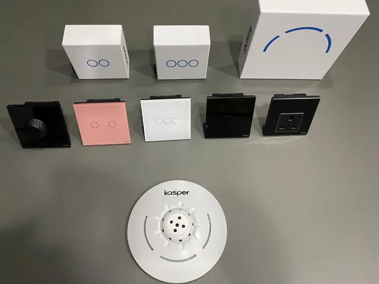 Kasper wall controls, socket and circular device displayed together.